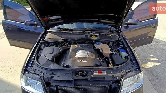 Синий Ауди А6, объемом двигателя 2.4 л и пробегом 317 тыс. км за 4500 $, фото 4 на Automoto.ua