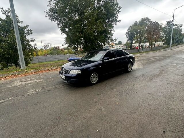 Синий Ауди А6, объемом двигателя 2.4 л и пробегом 223 тыс. км за 4000 $, фото 3 на Automoto.ua