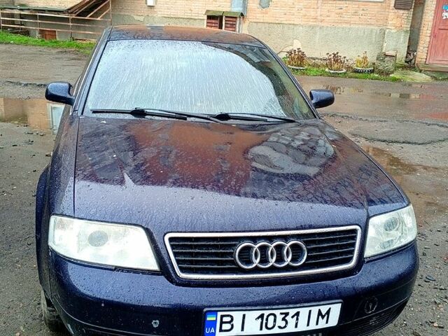 Синий Ауди А6, объемом двигателя 2.5 л и пробегом 300 тыс. км за 3500 $, фото 1 на Automoto.ua