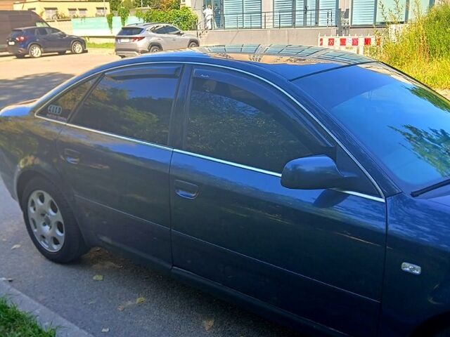 Синий Ауди А6, объемом двигателя 2 л и пробегом 350 тыс. км за 5000 $, фото 1 на Automoto.ua