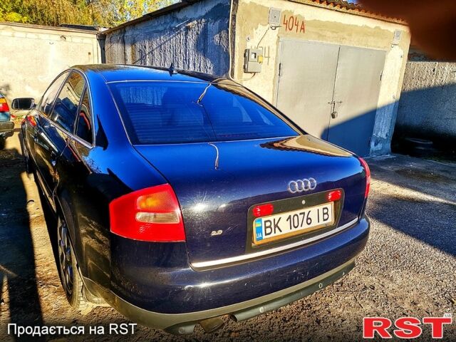 Синий Ауди А6, объемом двигателя 2 л и пробегом 320 тыс. км за 4900 $, фото 2 на Automoto.ua