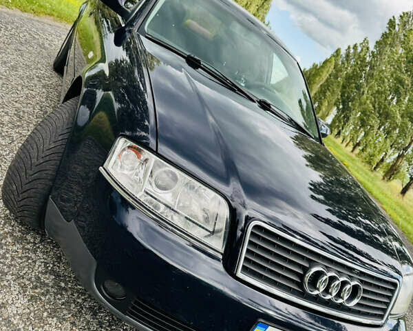 Синий Ауди А6, объемом двигателя 2.5 л и пробегом 389 тыс. км за 4500 $, фото 8 на Automoto.ua