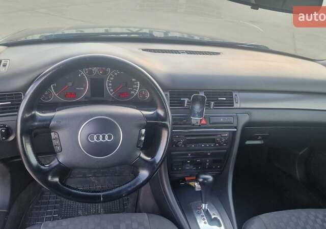 Синий Ауди А6, объемом двигателя 2.5 л и пробегом 396 тыс. км за 4000 $, фото 4 на Automoto.ua