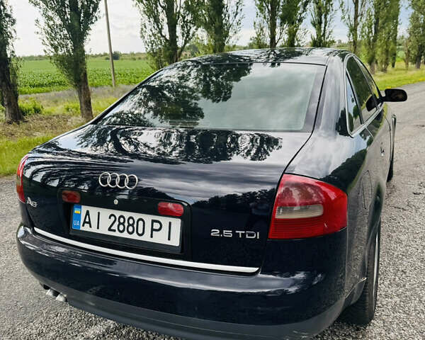 Синий Ауди А6, объемом двигателя 2.5 л и пробегом 389 тыс. км за 4500 $, фото 4 на Automoto.ua