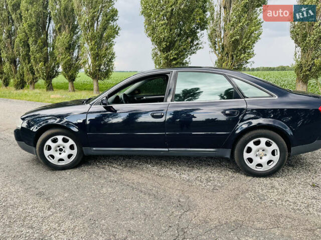 Синий Ауди А6, объемом двигателя 2.5 л и пробегом 389 тыс. км за 4500 $, фото 12 на Automoto.ua