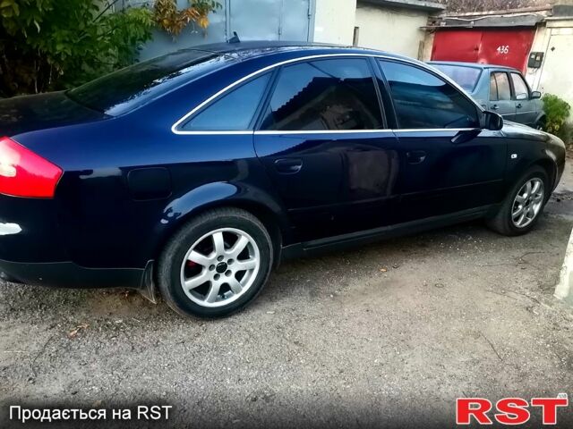 Синий Ауди А6, объемом двигателя 2 л и пробегом 320 тыс. км за 4900 $, фото 1 на Automoto.ua