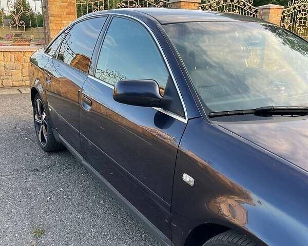 Синий Ауди А6, объемом двигателя 2.5 л и пробегом 278 тыс. км за 4500 $, фото 7 на Automoto.ua