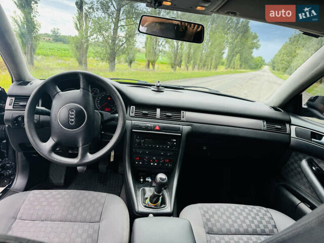 Синий Ауди А6, объемом двигателя 2.5 л и пробегом 389 тыс. км за 4500 $, фото 13 на Automoto.ua