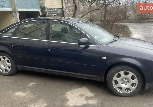 Синій Ауді А6, об'ємом двигуна 2.39 л та пробігом 315 тис. км за 3900 $, фото 4 на Automoto.ua