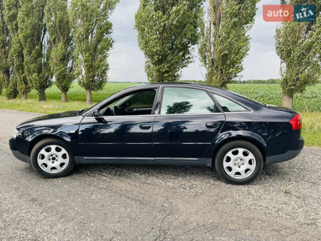 Синий Ауди А6, объемом двигателя 2.5 л и пробегом 389 тыс. км за 4500 $, фото 11 на Automoto.ua
