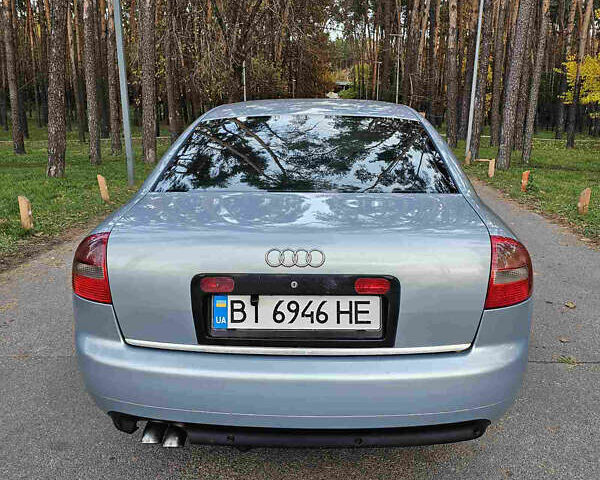 Синий Ауди А6, объемом двигателя 2.5 л и пробегом 335 тыс. км за 4600 $, фото 2 на Automoto.ua