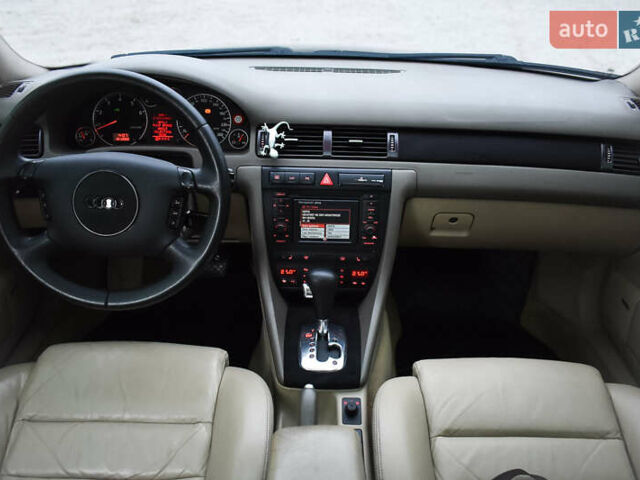 Синий Ауди А6, объемом двигателя 2.4 л и пробегом 246 тыс. км за 6900 $, фото 6 на Automoto.ua