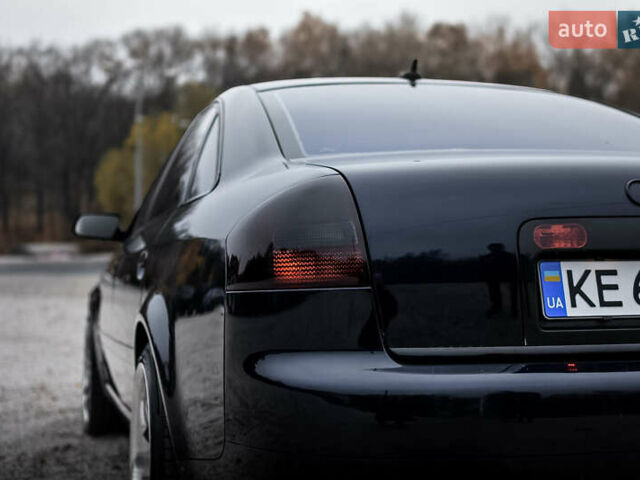 Синий Ауди А6, объемом двигателя 2.4 л и пробегом 246 тыс. км за 6900 $, фото 3 на Automoto.ua