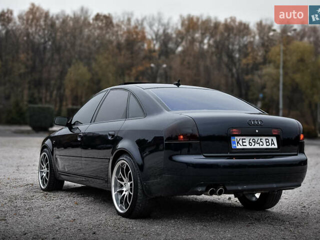 Синий Ауди А6, объемом двигателя 2.4 л и пробегом 246 тыс. км за 6900 $, фото 1 на Automoto.ua