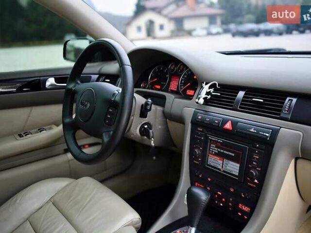 Синий Ауди А6, объемом двигателя 2.4 л и пробегом 246 тыс. км за 6900 $, фото 7 на Automoto.ua