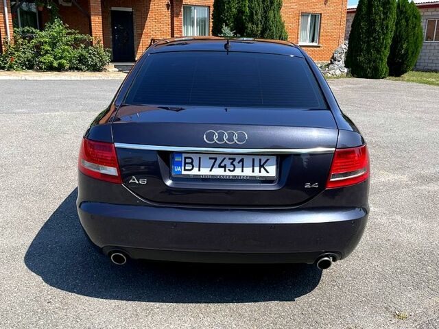 Синий Ауди А6, объемом двигателя 2.4 л и пробегом 228 тыс. км за 6700 $, фото 4 на Automoto.ua