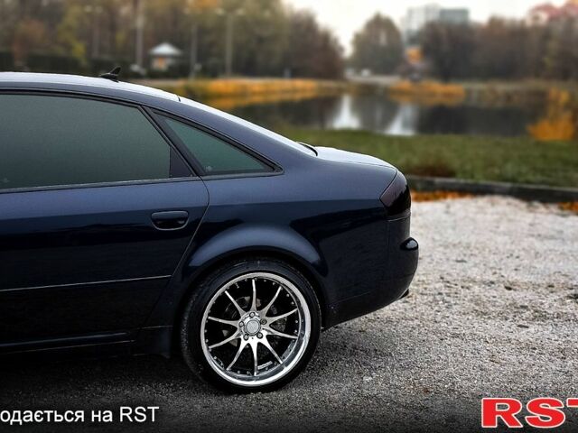 Синий Ауди А6, объемом двигателя 2.4 л и пробегом 246 тыс. км за 6900 $, фото 3 на Automoto.ua