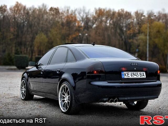 Синий Ауди А6, объемом двигателя 2.4 л и пробегом 246 тыс. км за 6900 $, фото 1 на Automoto.ua