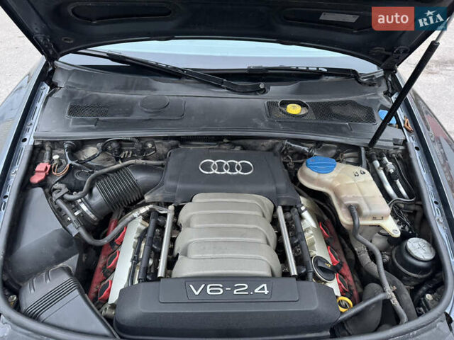 Синий Ауди А6, объемом двигателя 2.4 л и пробегом 379 тыс. км за 5300 $, фото 17 на Automoto.ua