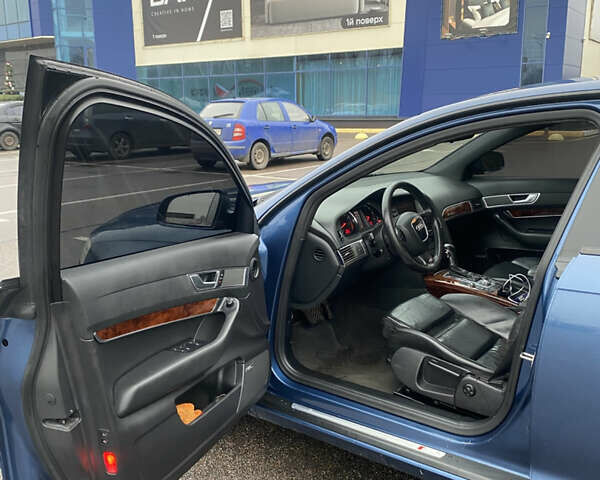 Синий Ауди А6, объемом двигателя 2.39 л и пробегом 233 тыс. км за 6500 $, фото 7 на Automoto.ua