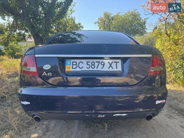 Синій Ауді А6, об'ємом двигуна 2.4 л та пробігом 263 тис. км за 2090 $, фото 2 на Automoto.ua