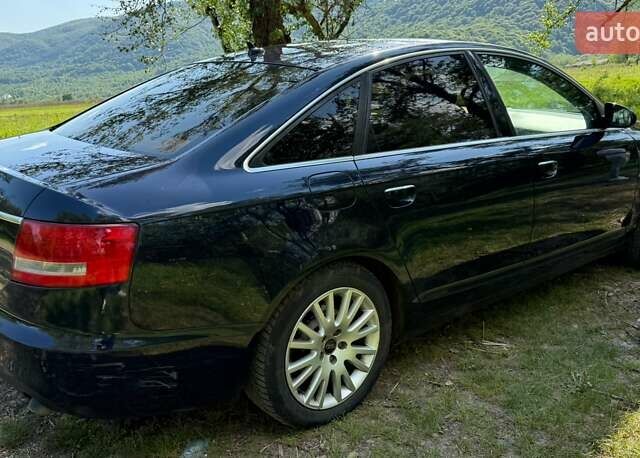 Синий Ауди А6, объемом двигателя 2 л и пробегом 180 тыс. км за 7250 $, фото 1 на Automoto.ua