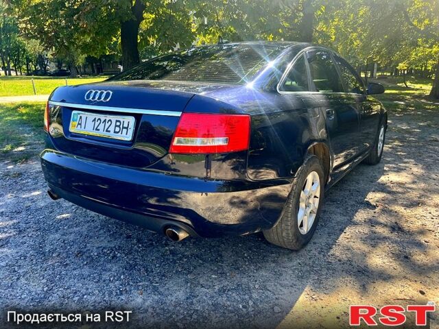 Синий Ауди А6, объемом двигателя 2.4 л и пробегом 317 тыс. км за 6900 $, фото 4 на Automoto.ua