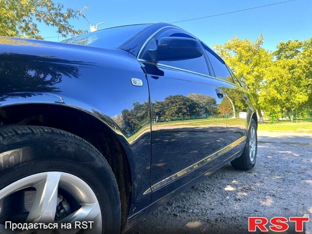 Синий Ауди А6, объемом двигателя 2.4 л и пробегом 317 тыс. км за 6900 $, фото 1 на Automoto.ua