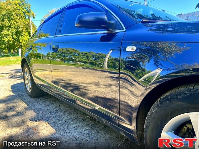 Синий Ауди А6, объемом двигателя 2.4 л и пробегом 317 тыс. км за 6900 $, фото 3 на Automoto.ua