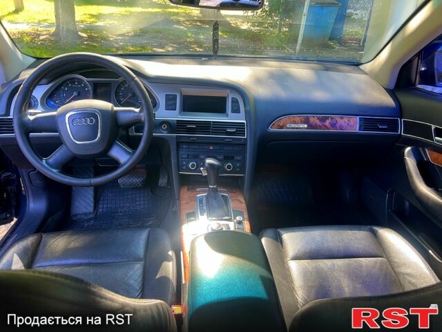 Синий Ауди А6, объемом двигателя 2.4 л и пробегом 317 тыс. км за 6900 $, фото 9 на Automoto.ua