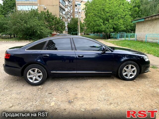Синий Ауди А6, объемом двигателя 2 л и пробегом 304 тыс. км за 9500 $, фото 1 на Automoto.ua