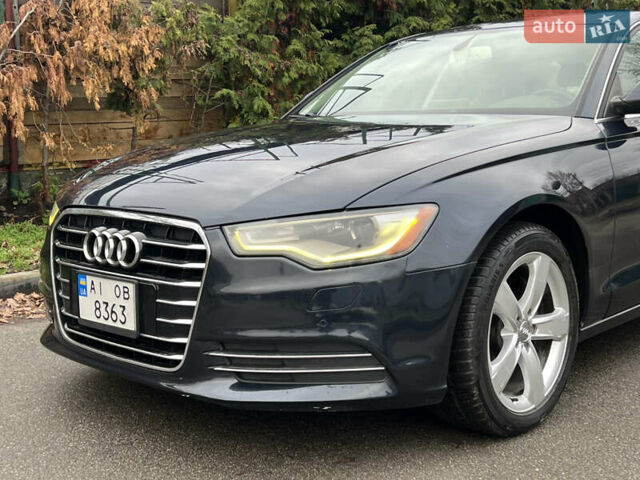 Синий Ауди А6, объемом двигателя 2 л и пробегом 203 тыс. км за 12500 $, фото 2 на Automoto.ua