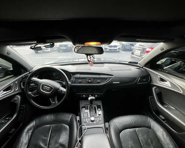 Синій Ауді А6, об'ємом двигуна 2 л та пробігом 312 тис. км за 13900 $, фото 4 на Automoto.ua