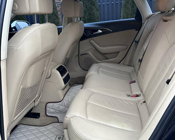 Синій Ауді А6, об'ємом двигуна 1.98 л та пробігом 172 тис. км за 12150 $, фото 15 на Automoto.ua