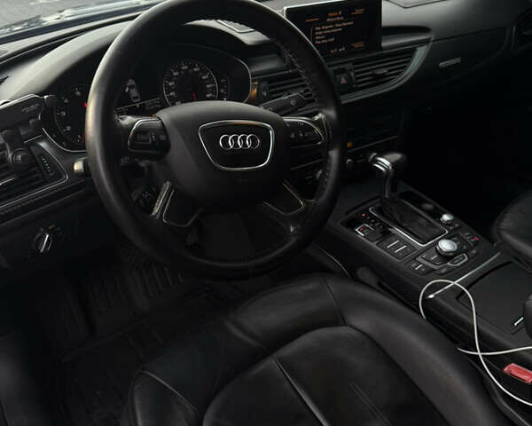 Синій Ауді А6, об'ємом двигуна 2 л та пробігом 312 тис. км за 13900 $, фото 16 на Automoto.ua