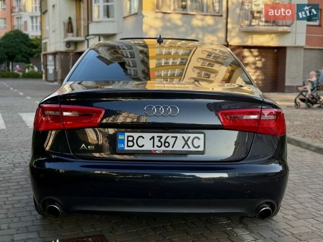 Синий Ауди А6, объемом двигателя 1.98 л и пробегом 243 тыс. км за 9900 $, фото 6 на Automoto.ua