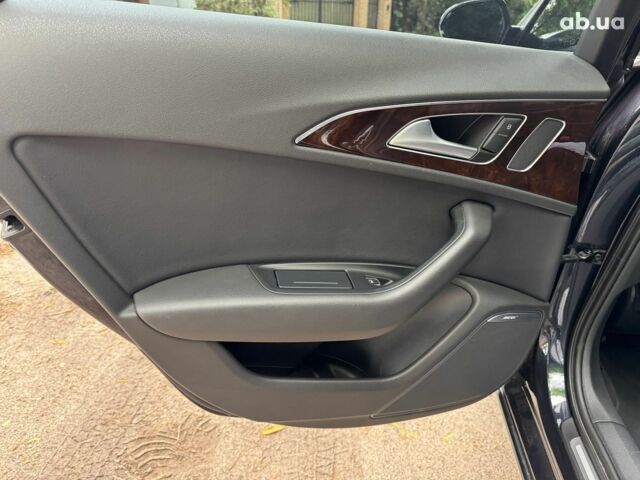 Синій Ауді А6, об'ємом двигуна 2 л та пробігом 180 тис. км за 16990 $, фото 19 на Automoto.ua