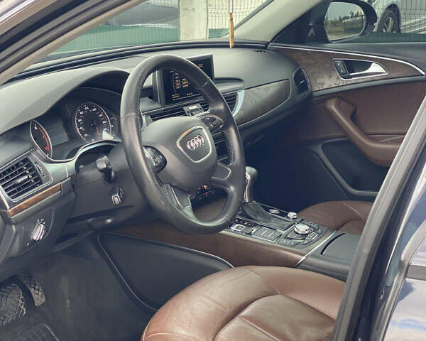 Синий Ауди А6, объемом двигателя 1.98 л и пробегом 260 тыс. км за 11800 $, фото 10 на Automoto.ua