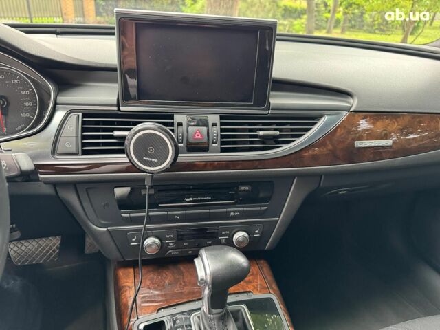 Синій Ауді А6, об'ємом двигуна 2 л та пробігом 180 тис. км за 16990 $, фото 17 на Automoto.ua