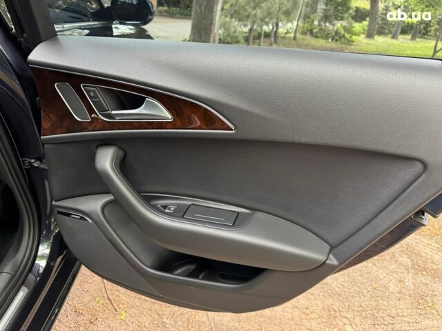 Синій Ауді А6, об'ємом двигуна 2 л та пробігом 180 тис. км за 16990 $, фото 23 на Automoto.ua