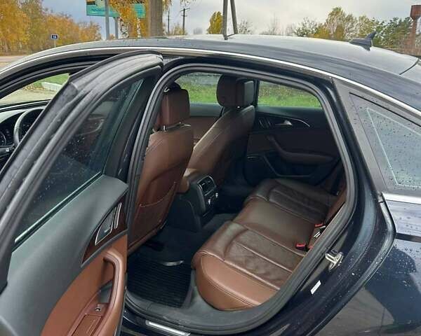 Синий Ауди А6, объемом двигателя 2 л и пробегом 210 тыс. км за 14000 $, фото 14 на Automoto.ua