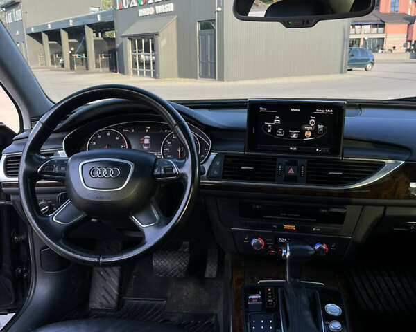Синий Ауди А6, объемом двигателя 2 л и пробегом 258 тыс. км за 14000 $, фото 9 на Automoto.ua