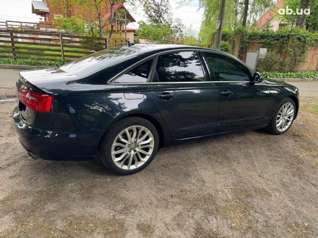 Синій Ауді А6, об'ємом двигуна 2 л та пробігом 180 тис. км за 16990 $, фото 5 на Automoto.ua