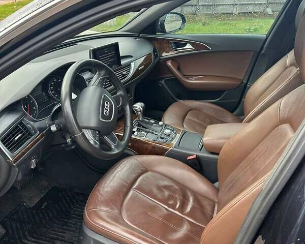 Синий Ауди А6, объемом двигателя 2 л и пробегом 210 тыс. км за 13600 $, фото 4 на Automoto.ua