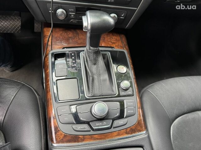 Синій Ауді А6, об'ємом двигуна 2 л та пробігом 180 тис. км за 16990 $, фото 18 на Automoto.ua