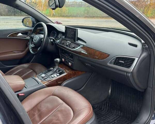 Синий Ауди А6, объемом двигателя 2 л и пробегом 210 тыс. км за 14000 $, фото 1 на Automoto.ua