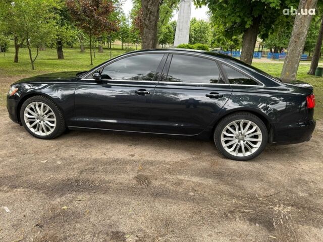 Синій Ауді А6, об'ємом двигуна 2 л та пробігом 180 тис. км за 16990 $, фото 10 на Automoto.ua