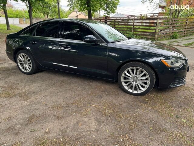 Синій Ауді А6, об'ємом двигуна 2 л та пробігом 180 тис. км за 16990 $, фото 4 на Automoto.ua