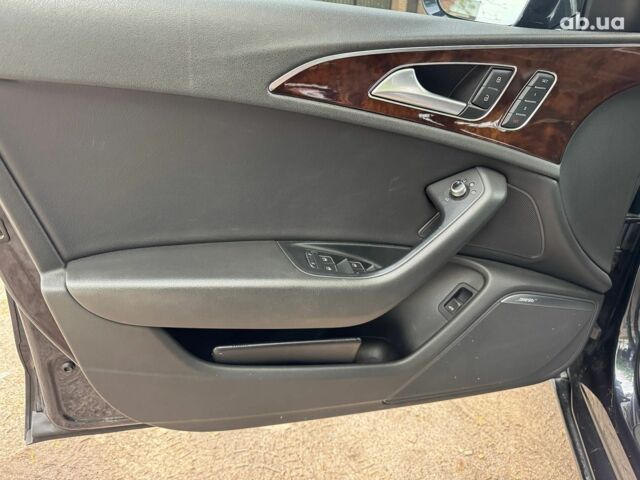 Синій Ауді А6, об'ємом двигуна 2 л та пробігом 180 тис. км за 16990 $, фото 12 на Automoto.ua