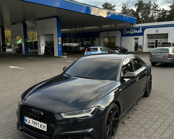 Синий Ауди А6, объемом двигателя 3 л и пробегом 189 тыс. км за 23000 $, фото 1 на Automoto.ua